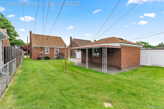 7652 Osage Ave, Allen Park, MI 48101 - back of property featuring a fenced backyard and brick siding