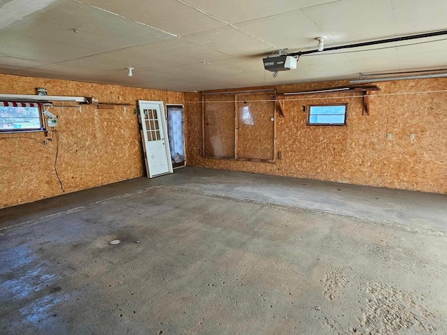 1363 Swain St, White Cloud, MI 49349 - garage featuring a garage door opener