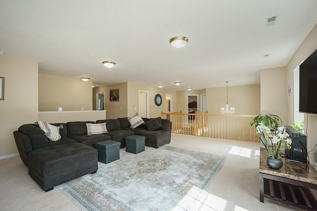 9354 Stratford Woods Trl, Kalamazoo, MI 49009 - living area featuring a chandelier and light carpet