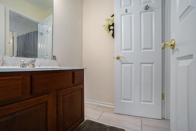 9354 Stratford Woods Trl, Kalamazoo, MI 49009 - full bathroom featuring vanity and baseboards