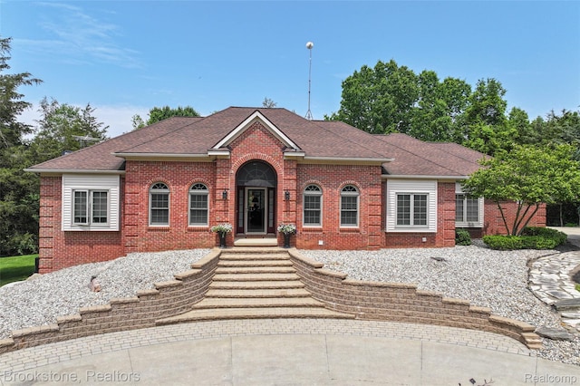 6439 Cohoctah Rd, Fenton, MI 48430 - view of front facade with brick siding and roof with shingles