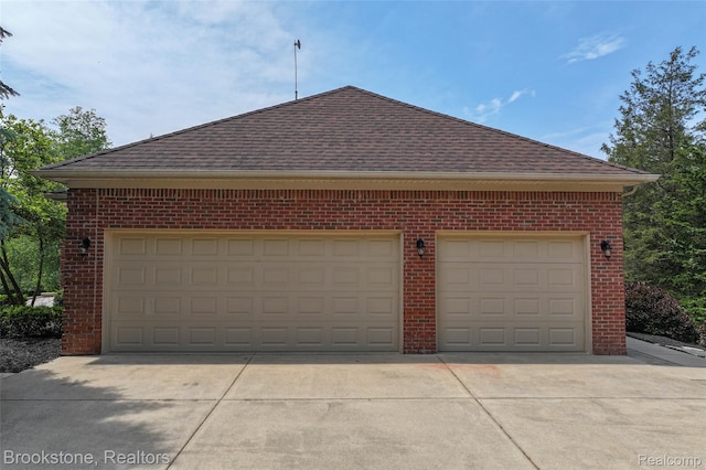 6439 Cohoctah Rd, Fenton, MI 48430 - garage with concrete driveway