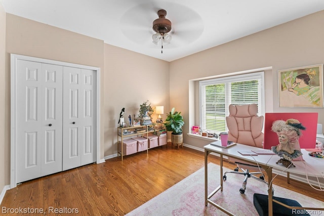 6439 Cohoctah Rd, Fenton, MI 48430 - home office featuring ceiling fan and wood finished floors