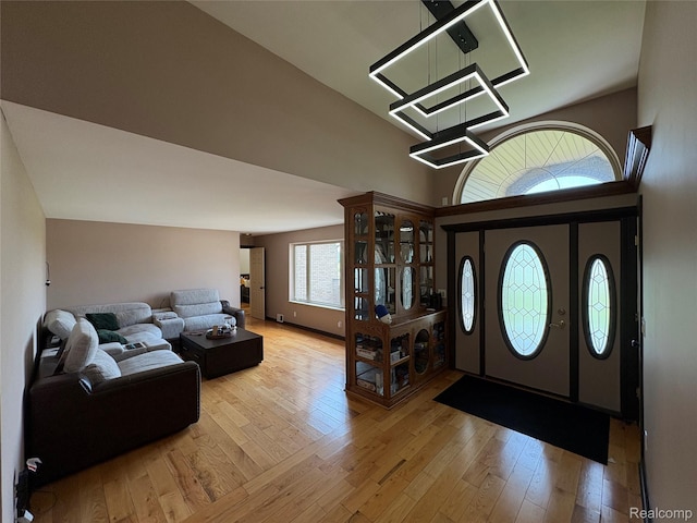 3351 Reid Rd, Swartz Creek, MI 48473 - foyer with light wood-type flooring and a high ceiling