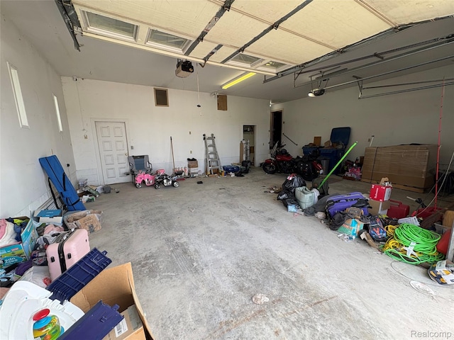 3351 Reid Rd, Swartz Creek, MI 48473 - garage featuring a garage door opener
