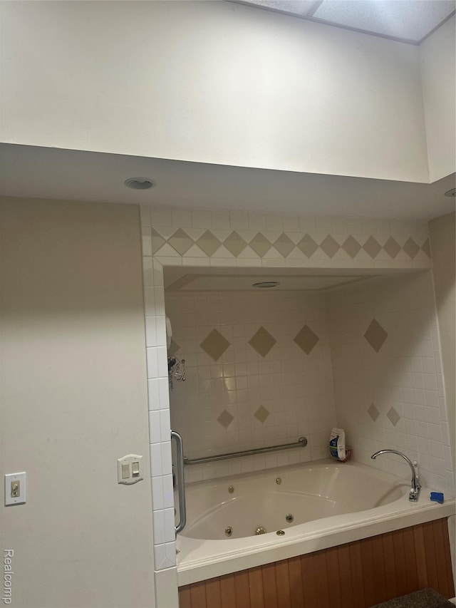 3351 Reid Rd, Swartz Creek, MI 48473 - bathroom featuring a combined bath / shower with jetted tub