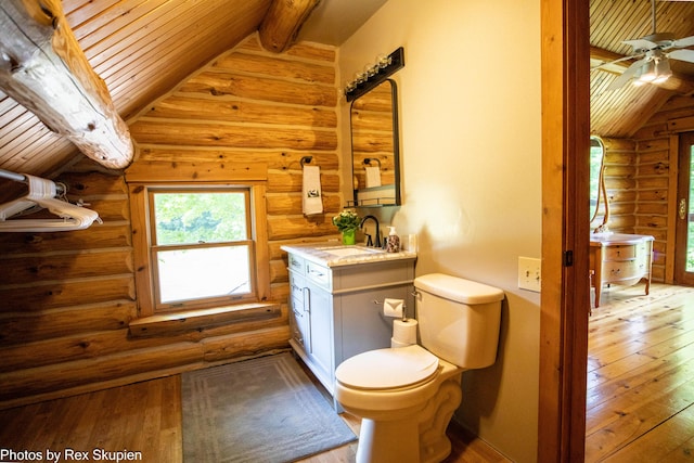 4585 W Arrowhead Dr, White Cloud, MI 49349 - bathroom with rustic walls, hardwood / wood-style floors, wood ceiling, vanity, and ceiling fan