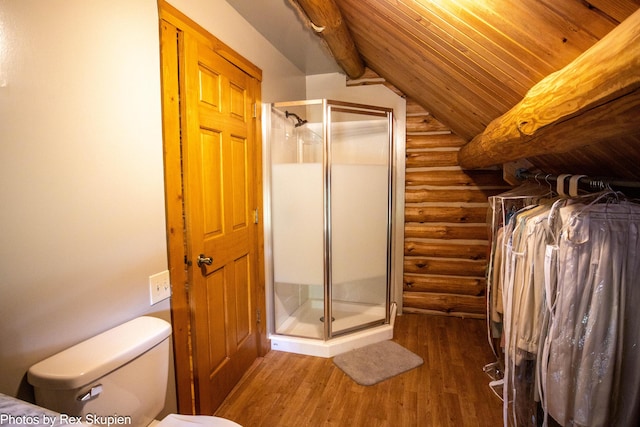 4585 W Arrowhead Dr, White Cloud, MI 49349 - bathroom with log walls, a stall shower, wood finished floors, vaulted ceiling, and wooden ceiling