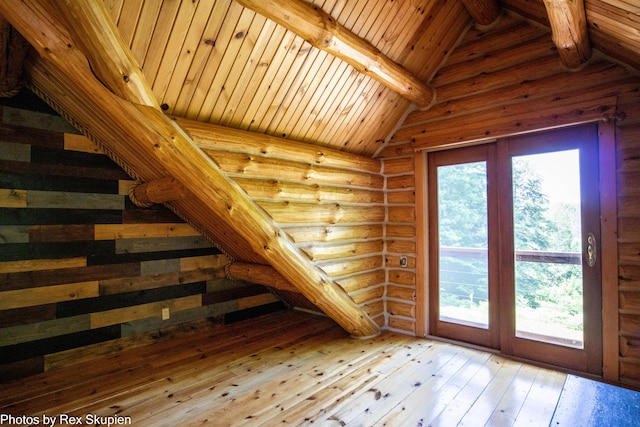 4585 W Arrowhead Dr, White Cloud, MI 49349 - doorway featuring hardwood / wood-style floors, rustic walls, and wood ceiling