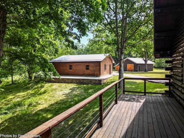 4585 W Arrowhead Dr, White Cloud, MI 49349 - wooden terrace with a yard and an outdoor structure