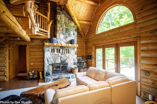 4585 W Arrowhead Dr, White Cloud, MI 49349 - living room with high vaulted ceiling, plenty of natural light, log walls, hardwood / wood-style flooring, and a wooden ceiling with exposed beams