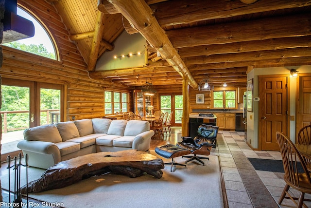 4585 W Arrowhead Dr, White Cloud, MI 49349 - living room with log walls, a wood ceiling with exposed beams, high vaulted ceiling, and light tile patterned flooring