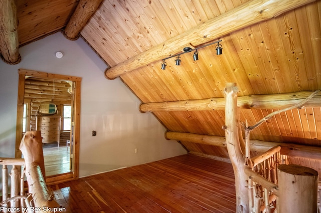 4585 W Arrowhead Dr, White Cloud, MI 49349 - additional living space with hardwood / wood-style floors and wooden ceiling