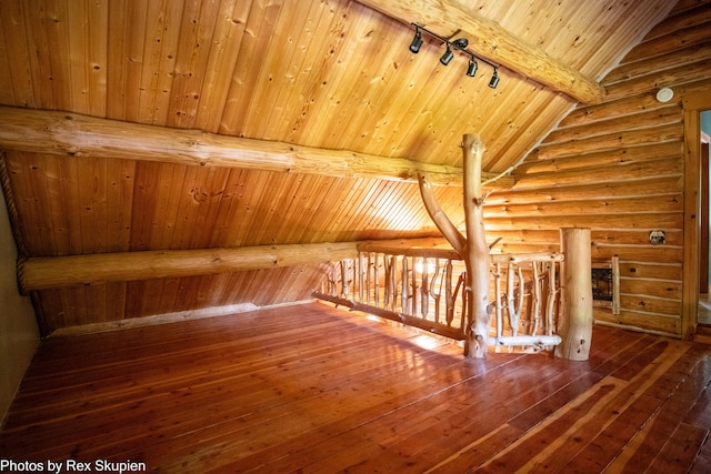 4585 W Arrowhead Dr, White Cloud, MI 49349 - additional living space featuring log walls, wooden ceiling, and hardwood / wood-style flooring