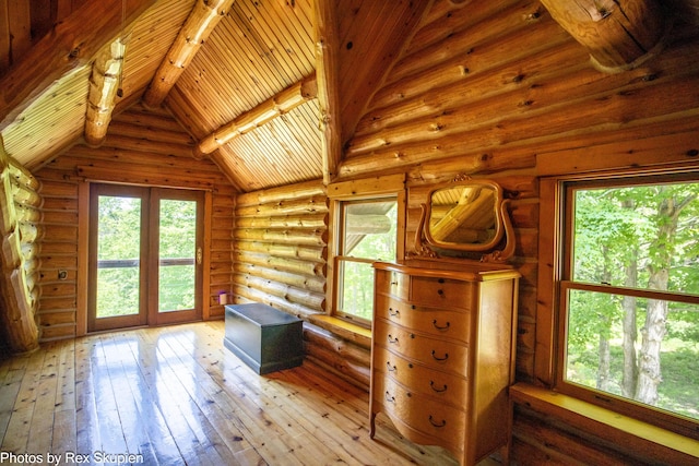 4585 W Arrowhead Dr, White Cloud, MI 49349 - interior space featuring hardwood / wood-style floors, rustic walls, and wood ceiling