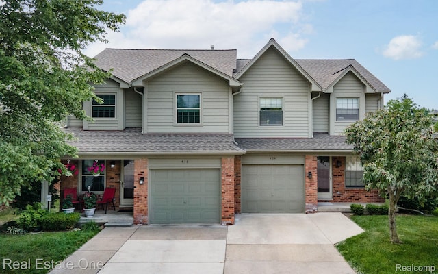 438 Oakgrove Ct, Clawson, MI 48017 - view of property featuring brick siding, driveway, roof with shingles, and a porch