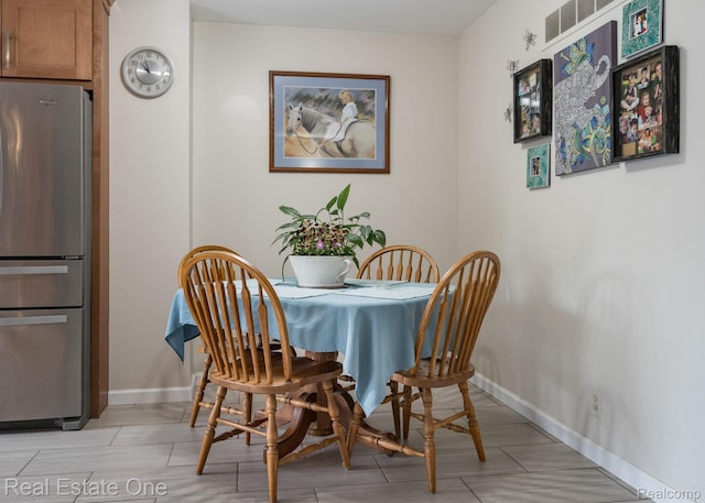 438 Oakgrove Ct, Clawson, MI 48017 - dining space with baseboards