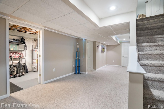 438 Oakgrove Ct, Clawson, MI 48017 - finished below grade area featuring stairway, gas water heater, carpet flooring, a paneled ceiling, and recessed lighting