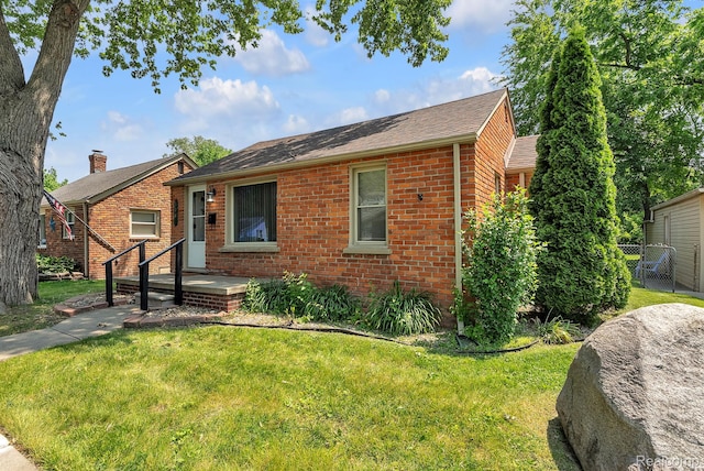 5941 Ziegler St, Taylor, MI 48180 - view of front of house with brick siding and a shingled roof