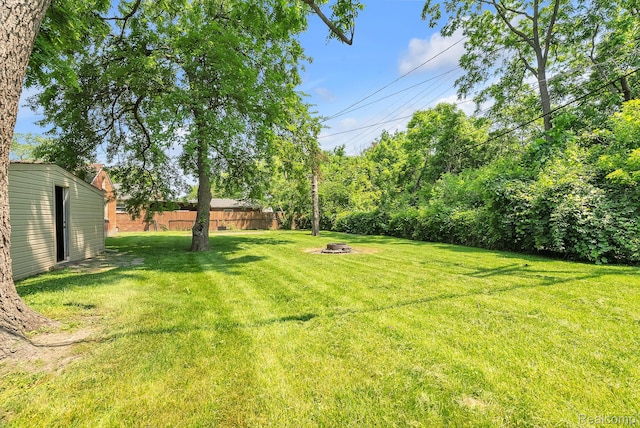 5941 Ziegler St, Taylor, MI 48180 - view of yard featuring a fire pit