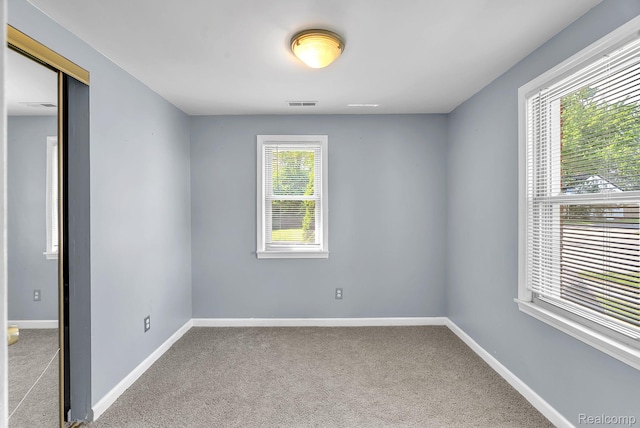 5941 Ziegler St, Taylor, MI 48180 - carpeted empty room with baseboards