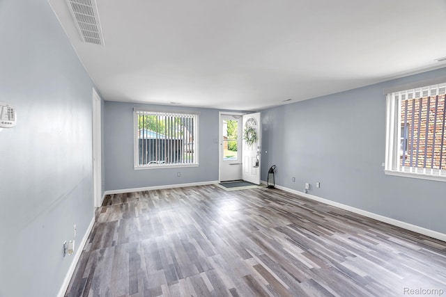 5941 Ziegler St, Taylor, MI 48180 - unfurnished room with baseboards and wood finished floors
