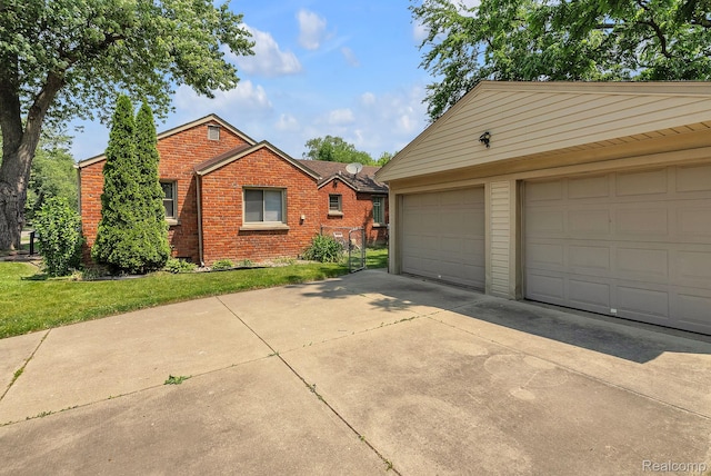 5941 Ziegler St, Taylor, MI 48180 - view of side of home featuring brick siding and a garage