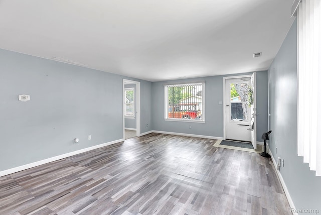 5941 Ziegler St, Taylor, MI 48180 - spare room featuring wood finished floors and baseboards