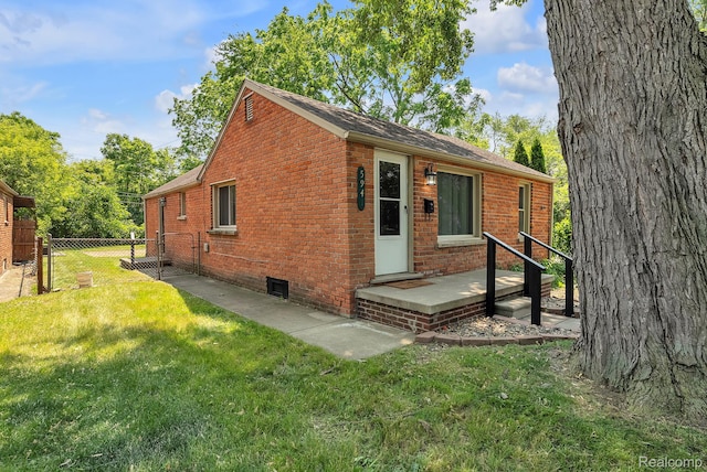 5941 Ziegler St, Taylor, MI 48180 - view of side of home featuring brick siding and roof with shingles