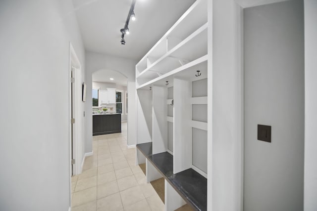874 Pinecrest, Dexter, MI 48130 - mudroom featuring arched walkways and light tile patterned floors