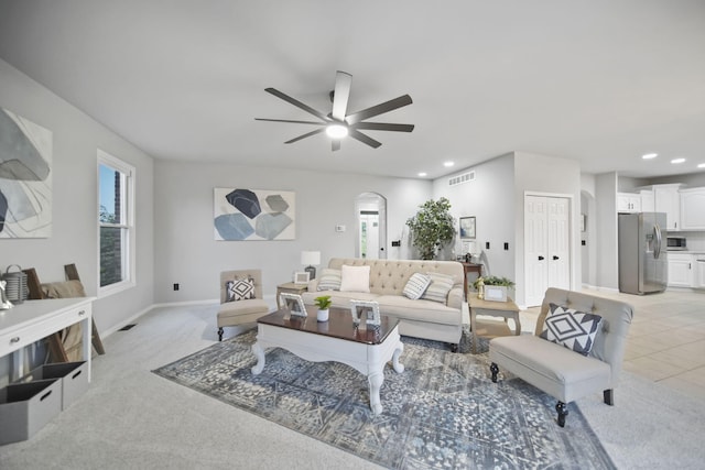 874 Pinecrest, Dexter, MI 48130 - living room featuring ceiling fan, arched walkways, and recessed lighting