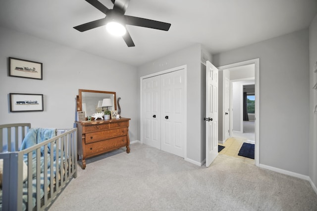 874 Pinecrest, Dexter, MI 48130 - bedroom featuring a closet, carpet, and a ceiling fan
