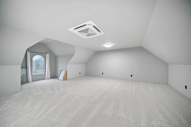 874 Pinecrest, Dexter, MI 48130 - additional living space with lofted ceiling and carpet flooring