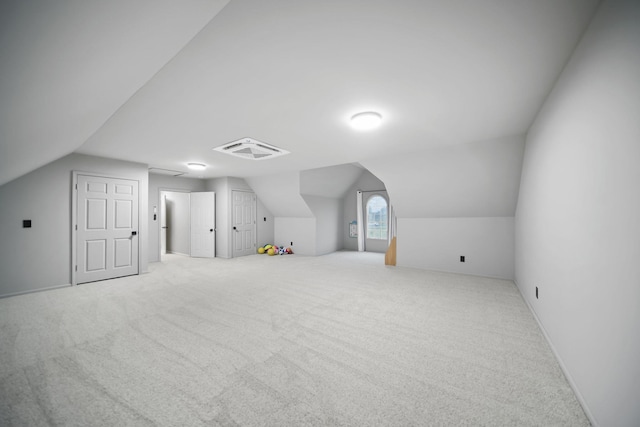874 Pinecrest, Dexter, MI 48130 - additional living space featuring vaulted ceiling and carpet