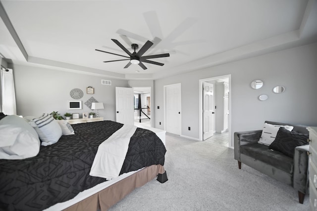 874 Pinecrest, Dexter, MI 48130 - bedroom with light carpet, a raised ceiling, and ceiling fan