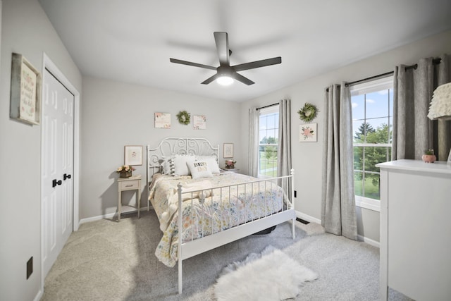 874 Pinecrest, Dexter, MI 48130 - bedroom featuring carpet floors, ceiling fan, and a closet
