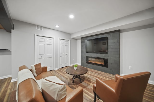 874 Pinecrest, Dexter, MI 48130 - living area featuring recessed lighting, wood finished floors, and a large fireplace