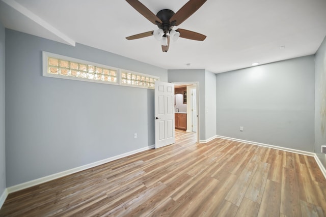 874 Pinecrest, Dexter, MI 48130 - empty room featuring a ceiling fan and light wood-style flooring