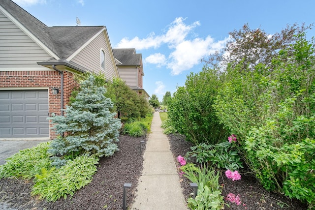 874 Pinecrest, Dexter, MI 48130 - view of yard with a garage