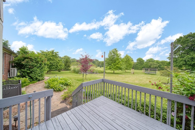 874 Pinecrest, Dexter, MI 48130 - wooden terrace with a lawn and view of wooded area
