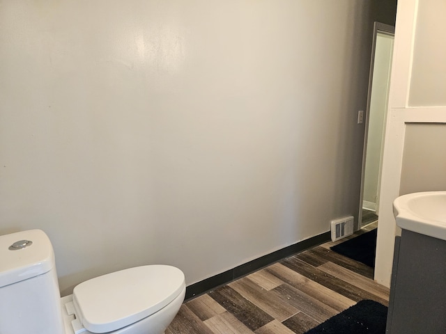 1406 Bixby Rd, Kalamazoo, MI 49048 - bathroom featuring wood finished floors and vanity