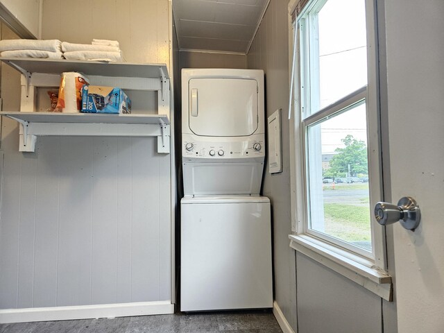 1406 Bixby Rd, Kalamazoo, MI 49048 - laundry room featuring stacked washer / dryer and baseboards