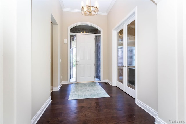 48913 Pinebrook Dr, Utica, MI 48315 - foyer with a chandelier, dark wood finished floors, ornamental molding, and french doors