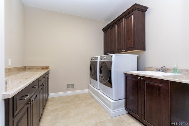 48913 Pinebrook Dr, Utica, MI 48315 - washroom featuring cabinet space and independent washer and dryer