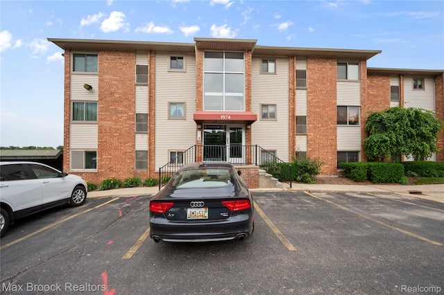 1974 Klingensmith Rd Unit 1-A, Bloomfield Hills, MI 48302 - view of property featuring uncovered parking