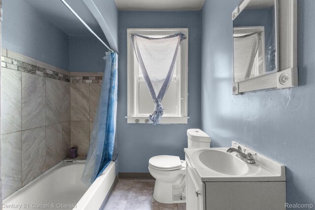 5527 Chalmers St, Detroit, MI 48213 - full bathroom with shower / bath combo with shower curtain, vanity, and tile patterned floors