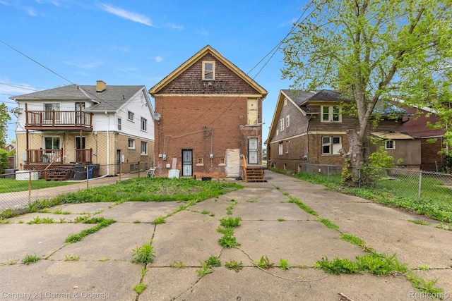 5527 Chalmers St, Detroit, MI 48213 - back of house featuring brick siding