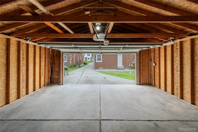 15648 Stricker Ave, Sterling Heights, MI 48021 - garage featuring a garage door opener