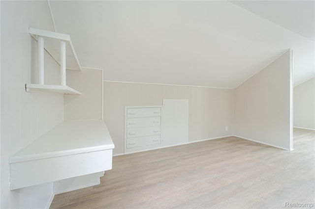 15648 Stricker Ave, Sterling Heights, MI 48021 - additional living space with light wood finished floors and vaulted ceiling