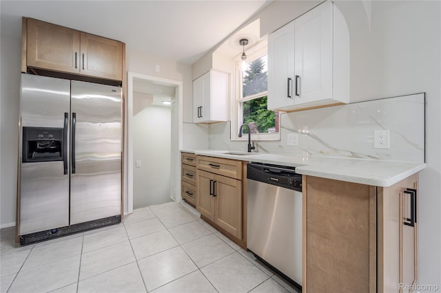 15648 Stricker Ave, Sterling Heights, MI 48021 - kitchen featuring stainless steel appliances, white cabinets, and light tile patterned flooring